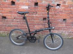 A BTUIN FOLDING COMMUTERS BICYCLE