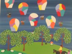 (XXI) GORDON BARKER - A MODERN FRAMED AND GLAZED PAINTING 'BALLOONS IN THE COUNTRYSIDE'