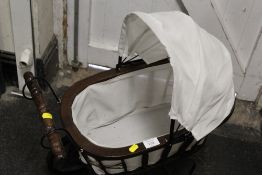 A WOODEN CHILDS PRAM