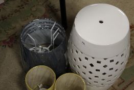 A CERAMIC WHITE GARDEN SEAT TOGETHER WITH A SELECTION OF NEW LAMP SHADES