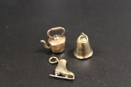 THREE 9CT GOLD CHARMS
