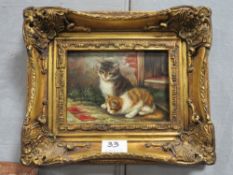 A SMALL GILT FRAMED MODERN PICTURE OF TWO KITTENS