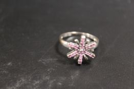 A 9CT WHITE GOLD DRESS RING