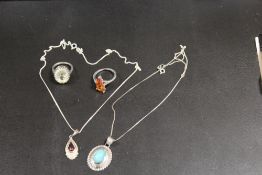 A VINTAGE SILVER TURQUOISE NECKLACE WITH TWO SILVER GEMSTONE RINGS