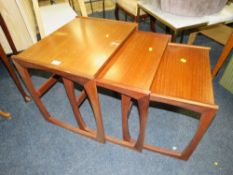 A MID CENTURY G-PLAN TEAK NEST OF TABLES - AS FOUND