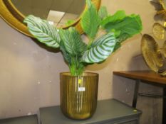 A LARGE MODERN GOLD PLANTER AND FAKE PLANT