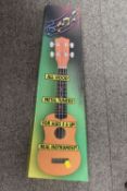 A CASED UKULELE