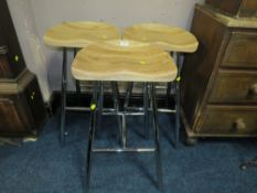 A SET OF THREE MODERN BAR STOOLS