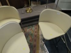 A SET OF FOUR MODERN CREAM CHAIRS PLUS A SPOT LAMP AND LOW GLOSS MEDIA CABINET
