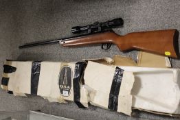 A VINTAGE BOXED BSA 2.2 AIR RIFLE WITH SCOPE AND PELLETS