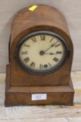 A VINTAGE WOODEN CASED MANTLE CLOCK