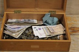 A BOX OF ASSORTED COINS AND NOTES
