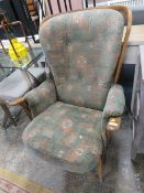 AN ERCOL STYLE ARMCHAIR