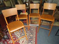 FOUR ASSORTED INDUSTRIAL STYLE STOOLS WITH ORANGE LEGS