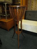 AN EDWARDIAN MAHOGANY INLAID JARDINIERE STAND H-95 CM