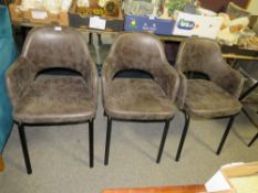 A SET OF THREE MODERN TUB STYLE ARMCHAIRS