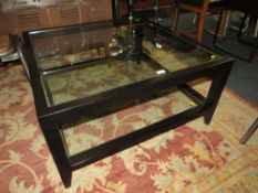 A MODERN GLASS TOPPED COFFEE TABLE 90 X 90 CM