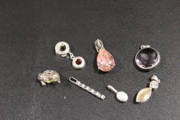 A COLLECTION OF VINTAGE SILVER GEMSTONE PENDANTS