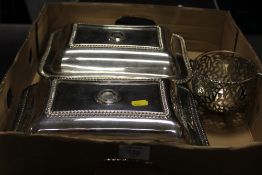 A SILVER PLATED PIERCED SWING HANDLED BASKET WITH CLEAR GLASS LINER TOGETHER WITH TWO SILVER