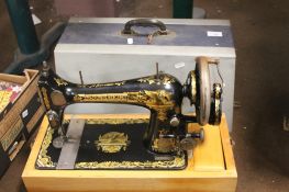 A CASED SEWING MACHINE WITH KEY INCLUDED
