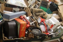 FOUR TRAYS CONTAINING A BOXED TELESCOPE, CLOCKS, PICTURE FRAMES, TOOLS, LAMPS, CARPET ETC (TRAYS NOT