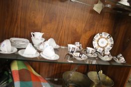 AN ANTIQUE CROWN STAFFORSHIRE PART TEA SET ALONG WITH A PART ROYAL STAFFORD TEA SET