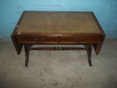 A DROP LEAF INLAID LEATHER TABLE