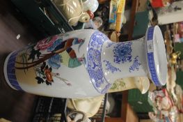 A LARGE ORIENTAL VASE WITH BIRD AND FLOWER PATTERN