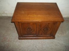 AN ANTIQUE COAL STORAGE BOX WITH STEEL LINER