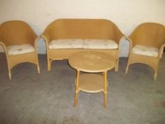 A LLOYD LOOM 4 PIECE CONSERVATORY SUITE TO INCLUDE 2 SEATER, 2 CHAIRS, AND TABLE
