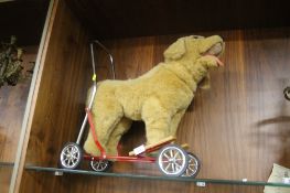 A VINTAGE TOY PUSH- ALONG DOG