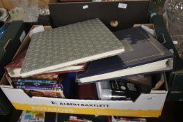 A TRAY CONTAINING PHOTO ALBUMS AND TOGETHER WITH 3 DISNEY DVD (TRAY NOT INCLUDED)