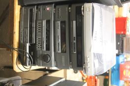 A STACKING AKAI SOUND SYSTEM WITH TWIN CASSETTE DECK, AMPLIFIER , SYNTHESISER, WITH AIWA RECORD