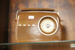 A BUSH RETRO STYLE PORTABLE RADIO