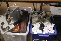 TWO PLASTIC TUBS CONTAINTING CHINA MUGS, GENTS UMBRELLA, TABLE LAMP BASE, JARS ETC