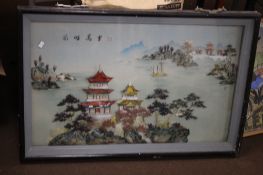 A FRAMED ORIENTAL TYPE PICTURE