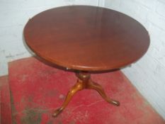 A GEORGIAN TILT TOP MAHOGANY TABLE