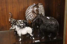 THREE WOODEN ELEPHANTS AND A CHINA HORSE