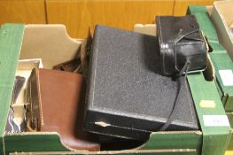 A BOX OF COLLECTABLES TO INCLUDE CAMERAS, CUTLERY, RAZORS ETC