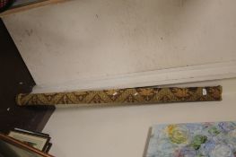 A ROLL OF WOVEN FABRIC