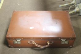 A LARGE VINTAGE SUITCASE