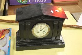 A SLATE MANTLE CLOCK
