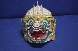 AN UNUSUAL FAR EASTERN DECORATIVE MASK OF A DRAGON