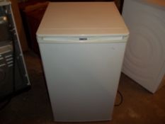 AN UNDER-COUNTER FREEZER