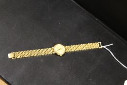 A LADIES RAYMOND WEIL WATER RESISTANT WRISTWATCH WITH DATE DIAL SET WITH WHITE STONES TO CHAPTER