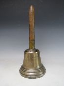 A 19TH CENTURY ISLE OF MAN WOODEN HANDLED HANDBELL, inscribed J. Kewley, Douglas, 1835', overall H
