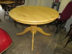 A MODERN CIRCULAR PEDESTAL TABLE