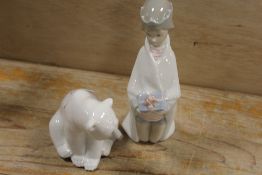 A LLADRO FIGURE OF A POLAR BEAR TOGETHER WITH A LLADRO THREE KINGS FIGURE
