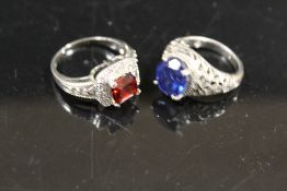 TWO LARGE VINTAGE SILVER GEMSTONE RINGS