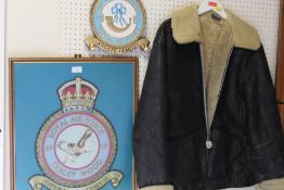 A VINTAGE FLYING JACKET TOGETHER WITH AN RAF ROYAL SQUADRON PLAQUE PLUS ANOTHER (3)